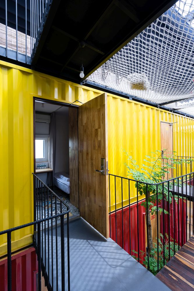 Yellow Container Ccasa Hostel Vietnam by TAK architects