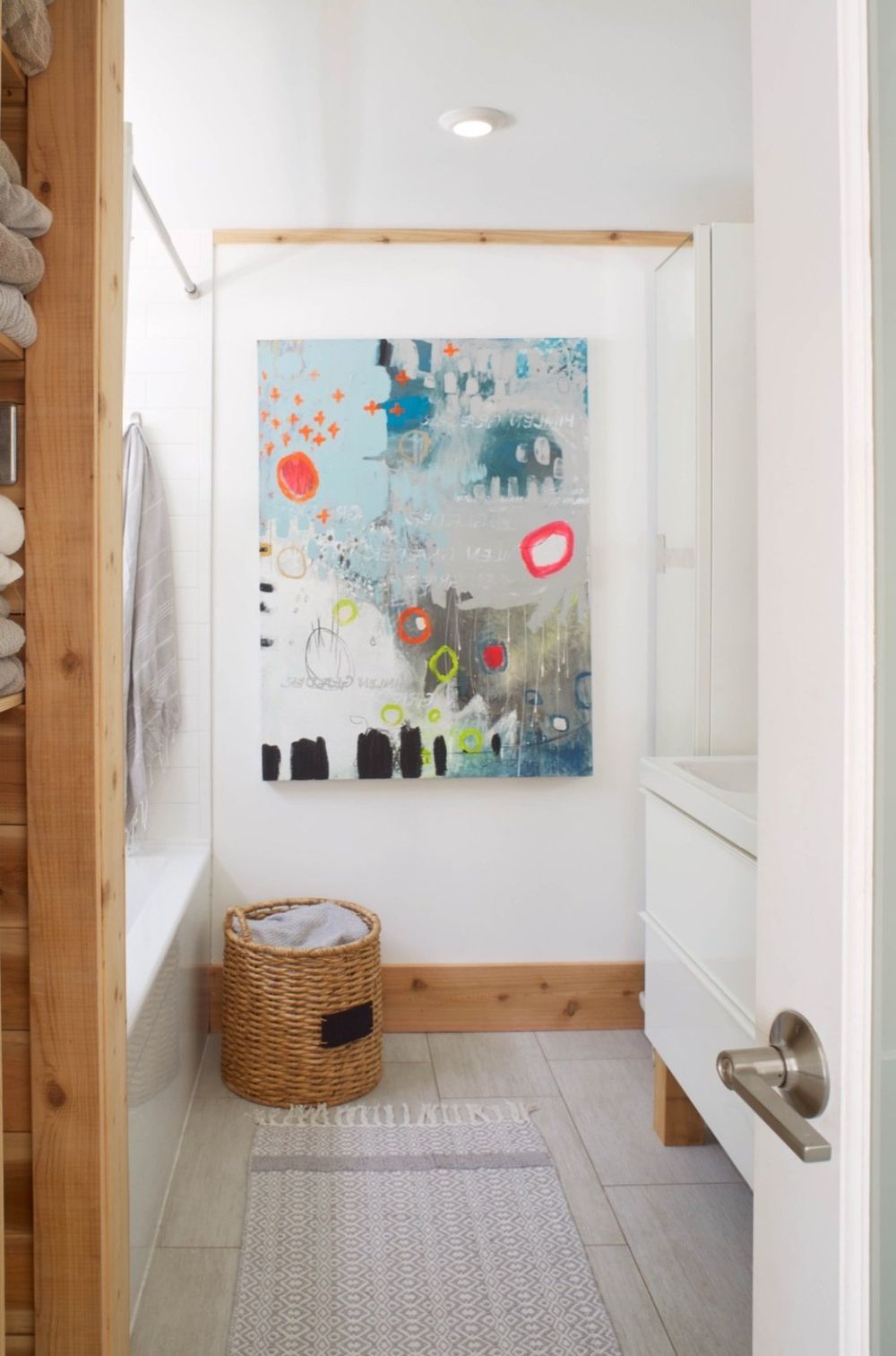 The same simple, Scandinavian-inspired decor was used in all the spaces, including the bathroom