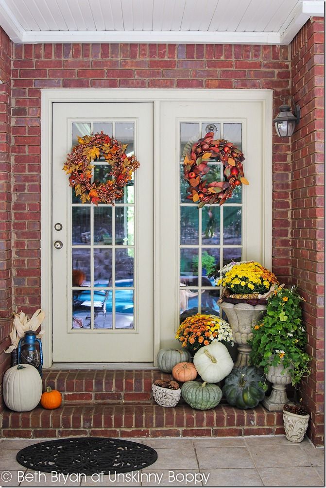 Baskets with flowers and pumpkins