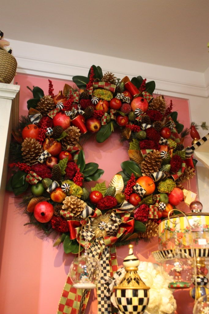 Try using a big and bountiful wreath indoors.