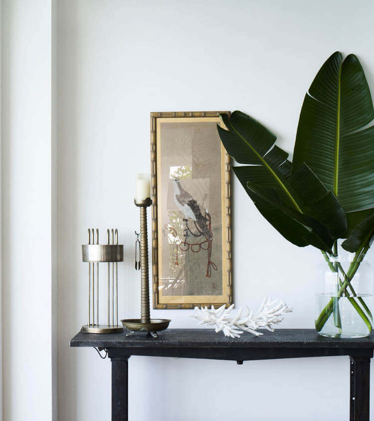 tiny foyer design with a narrow console and mirror