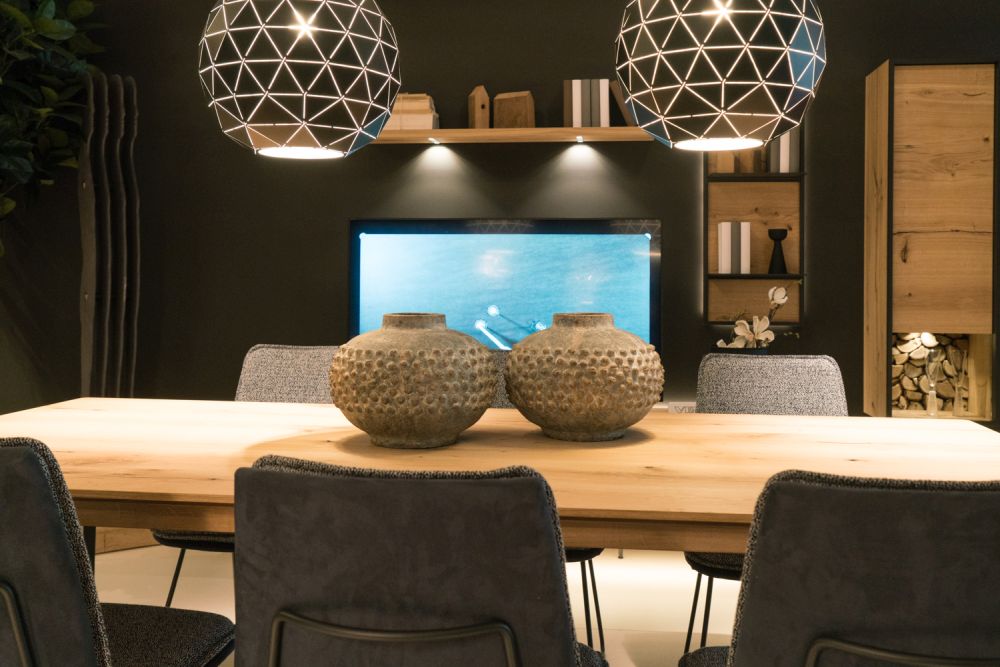 Oversized lighting above the dining table