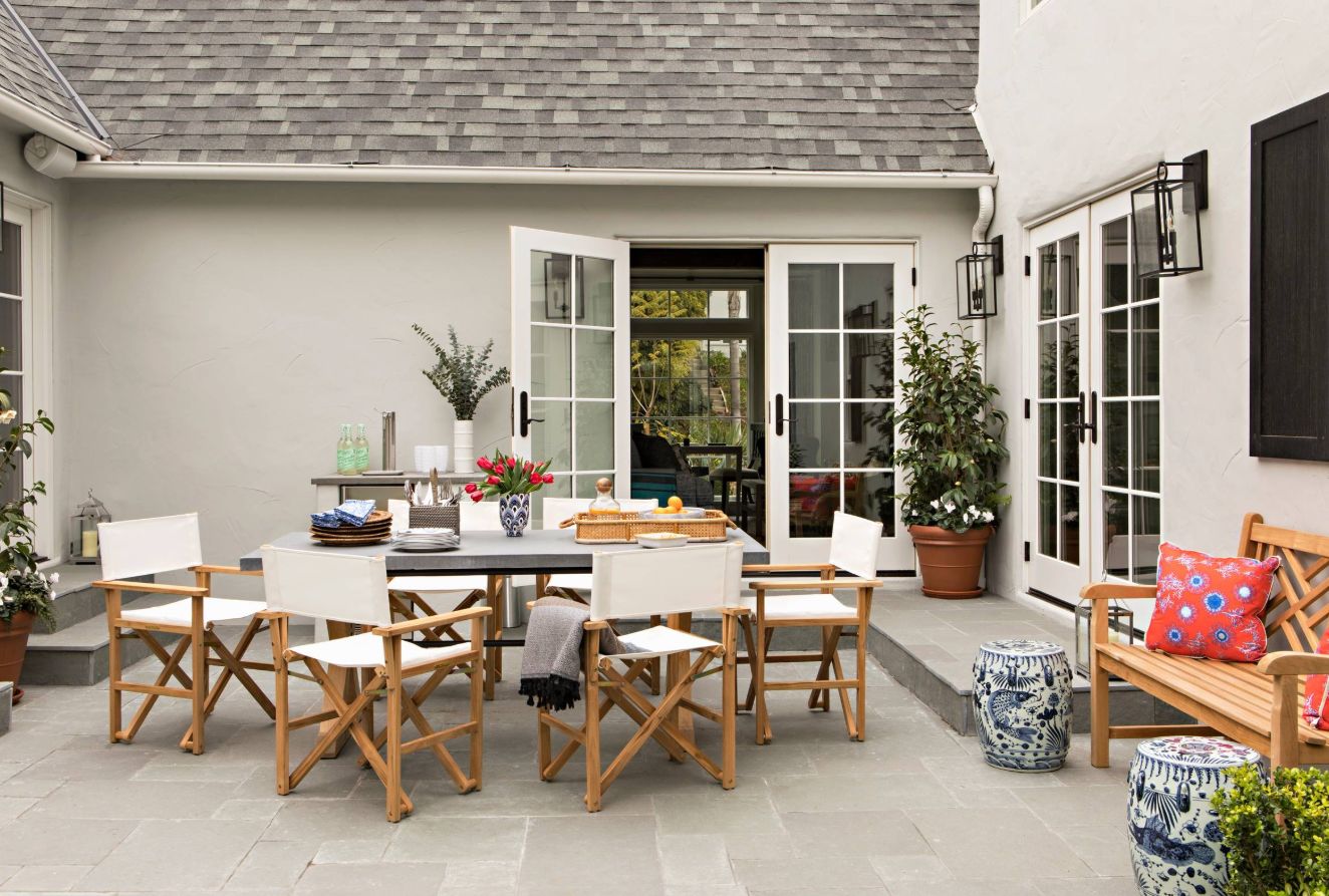 A patio courtyard is done in transitional style.