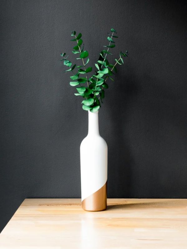 Elegant white and gold wine bottle vase