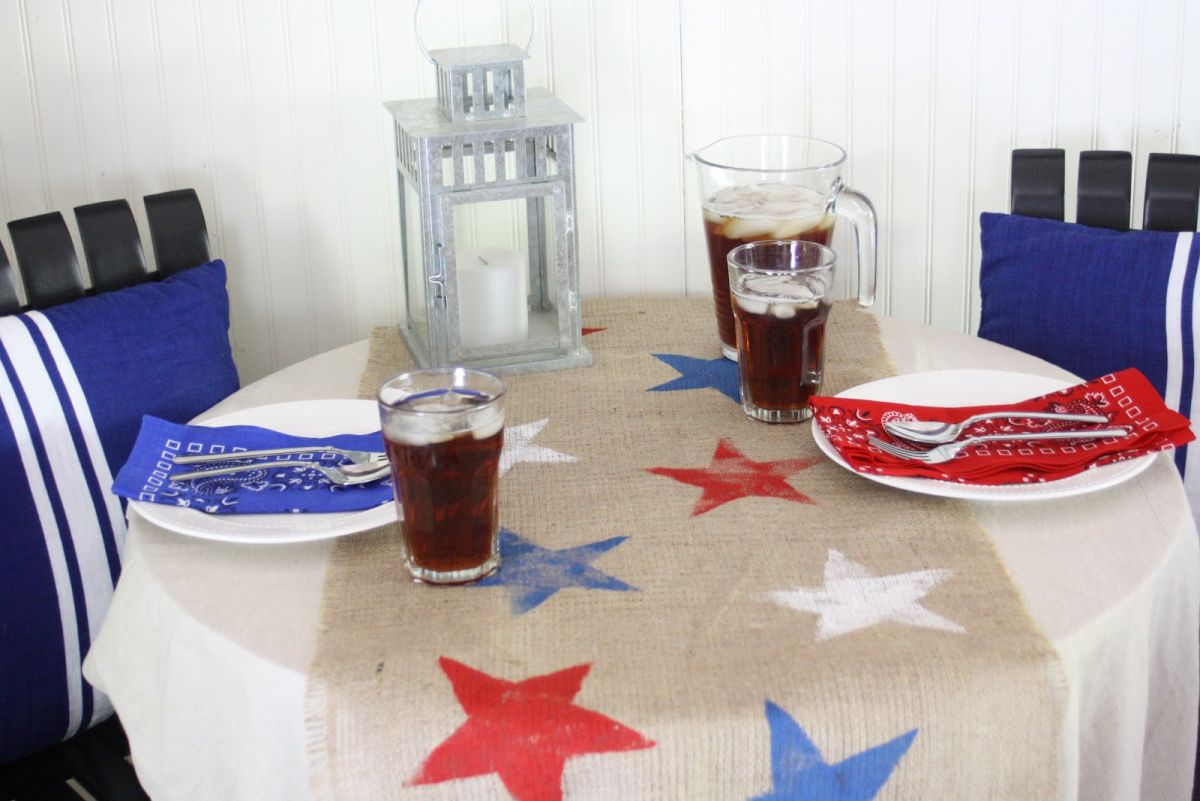 COvered porch decorated for 4th of July