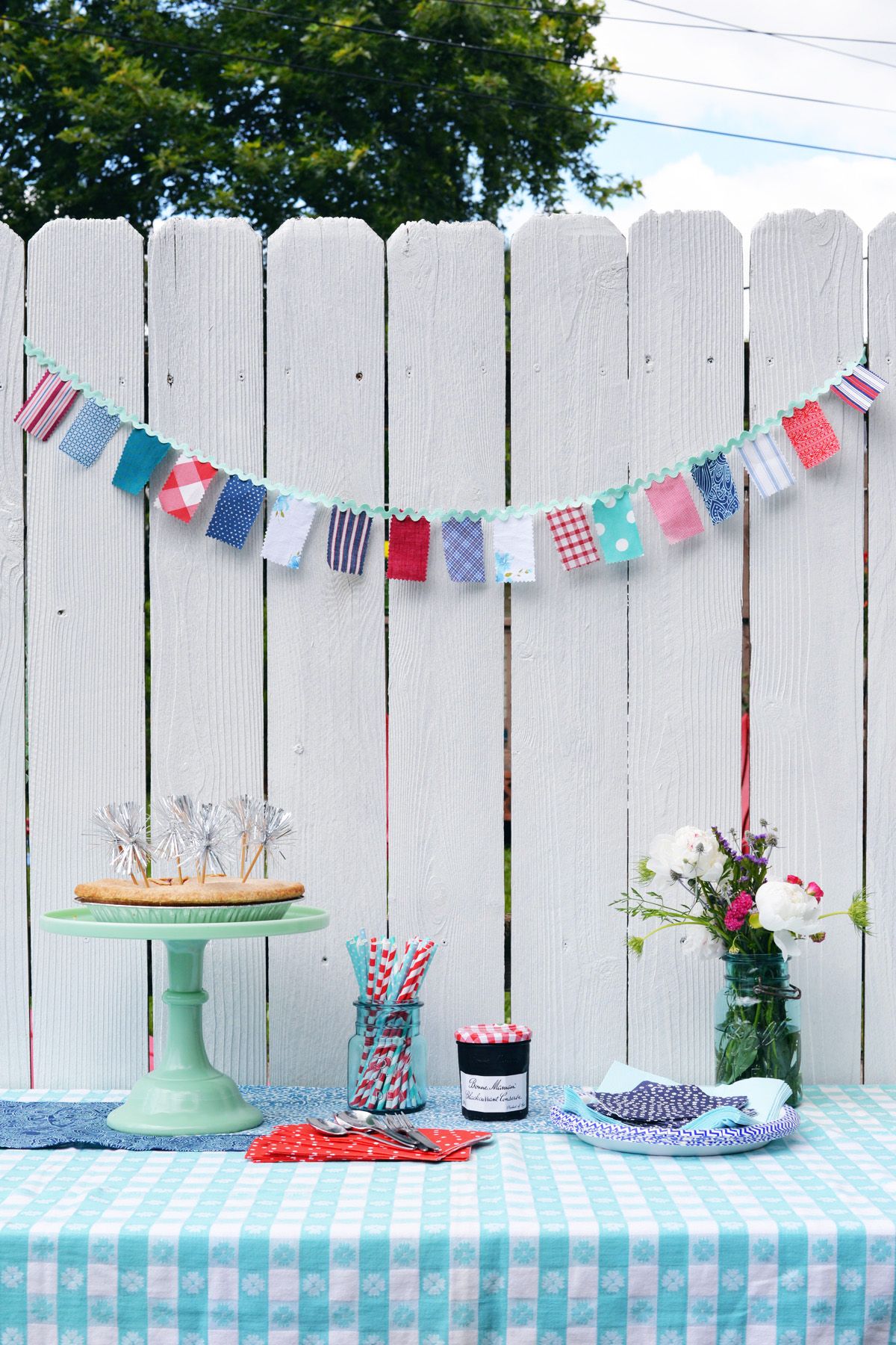 COvered porch decorated for 4th of July