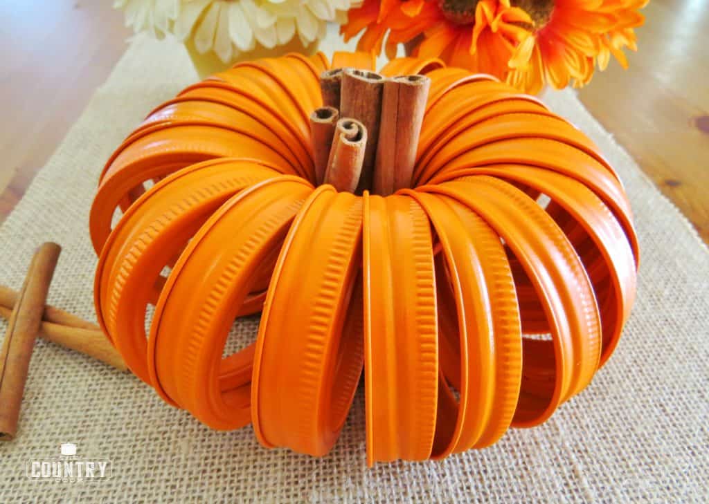 https://www.thecountrycook.net/mason-jar-lid-pumpkins/