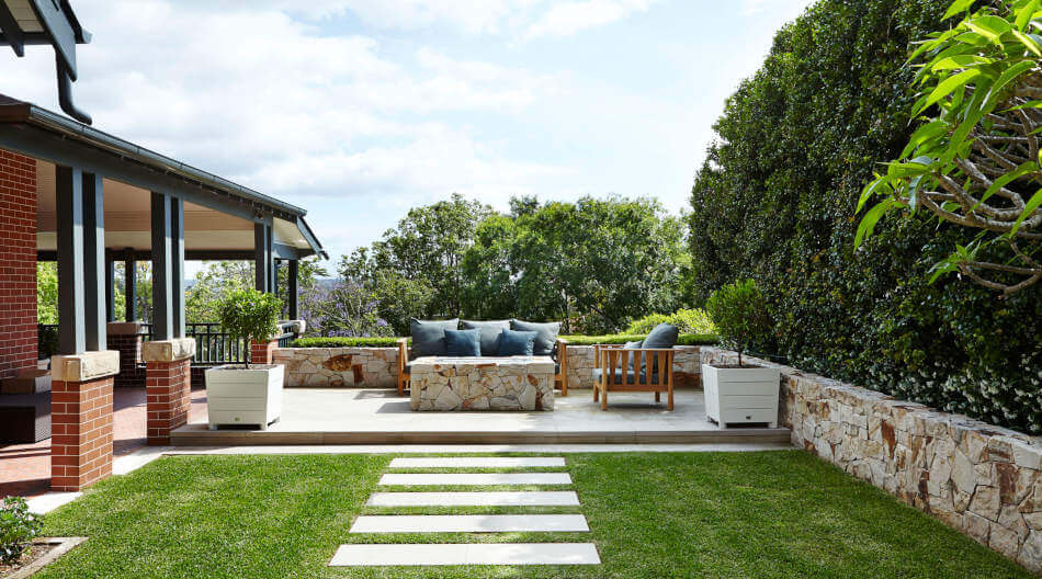 Flagstone pathway to modern seating