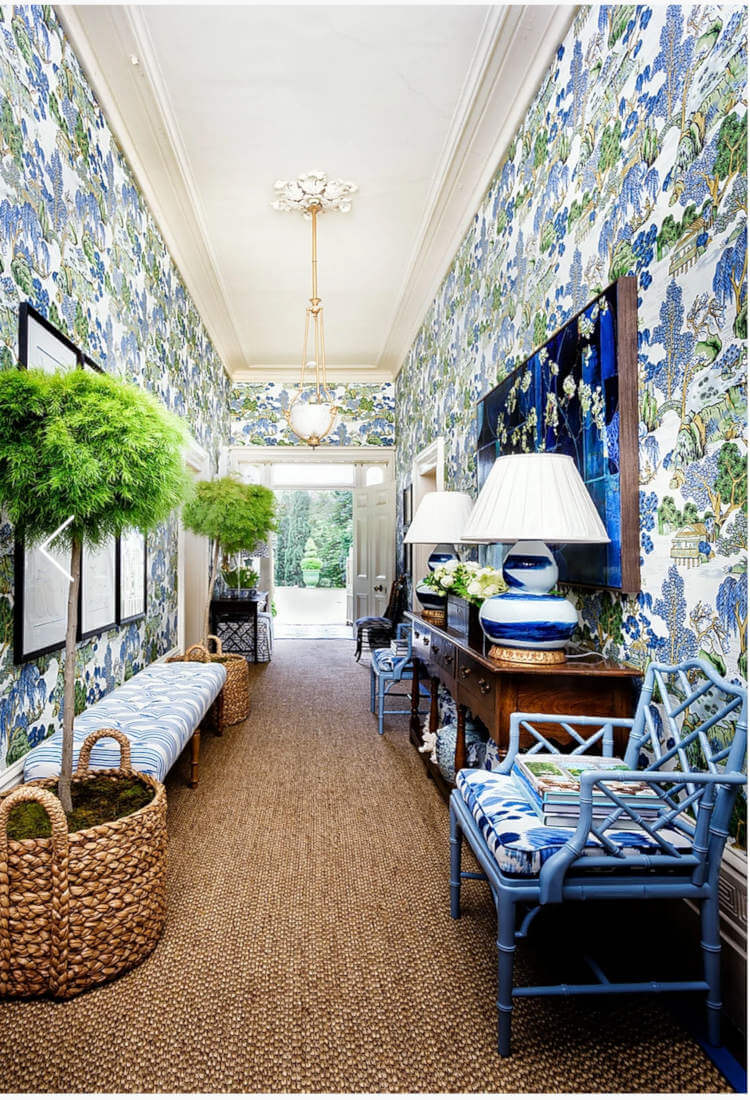 Busy blue hallway with wallpaper 698x1024