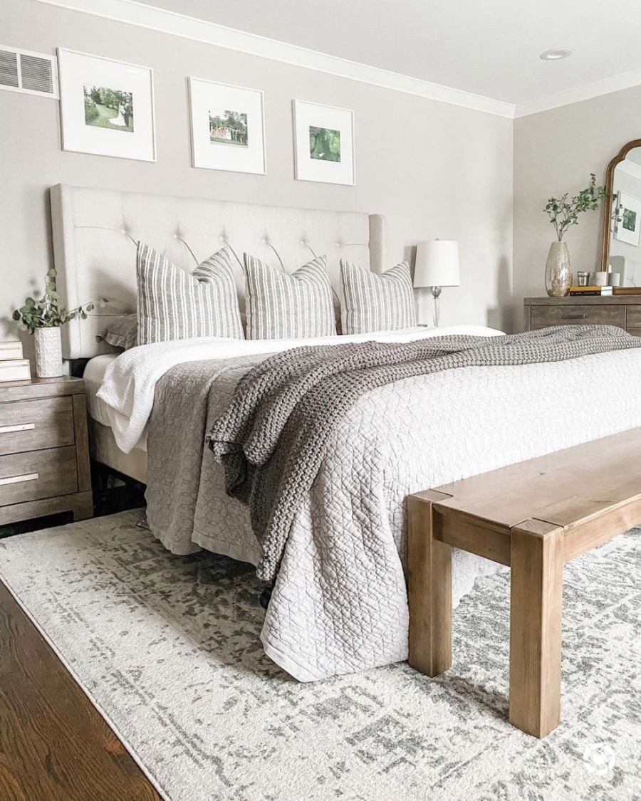 Bedroom with wooden floor and grey paint walls