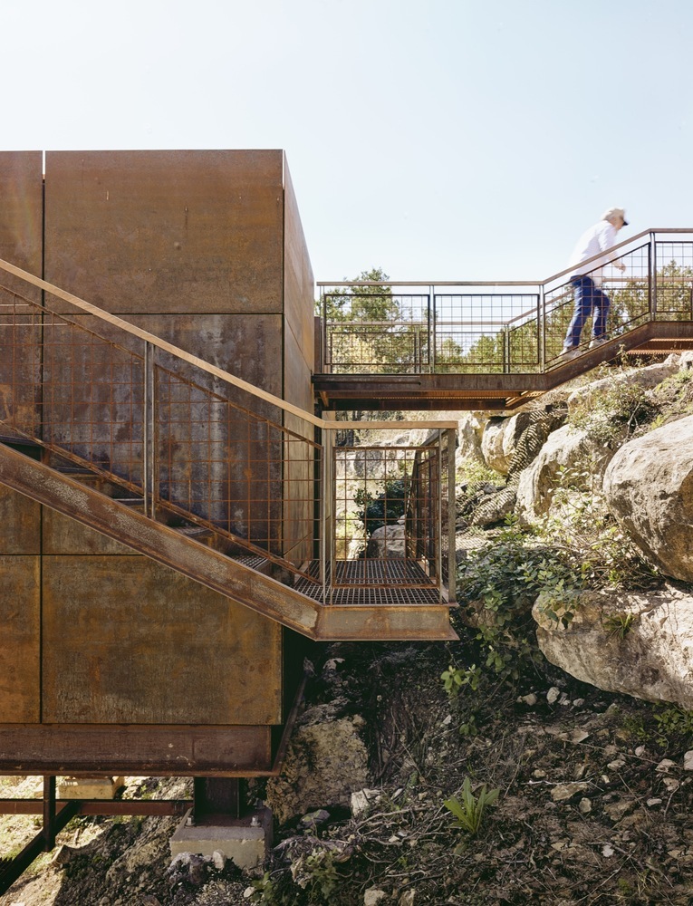 The cabin had to be built above the ground and on stilts due to the difficult topography