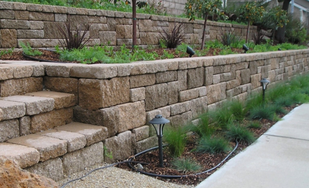 Stacked stone retaining wall