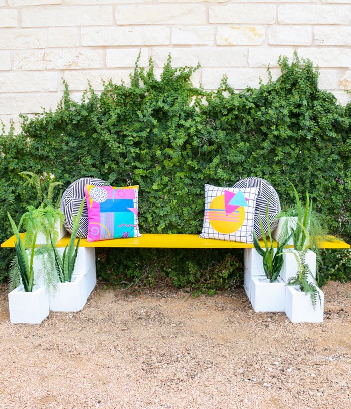 Outdoor bench with planters