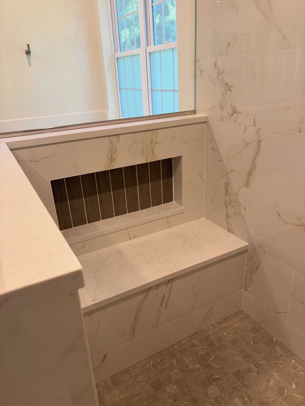 Shower Bench Fits Beneath a Recessed Niche