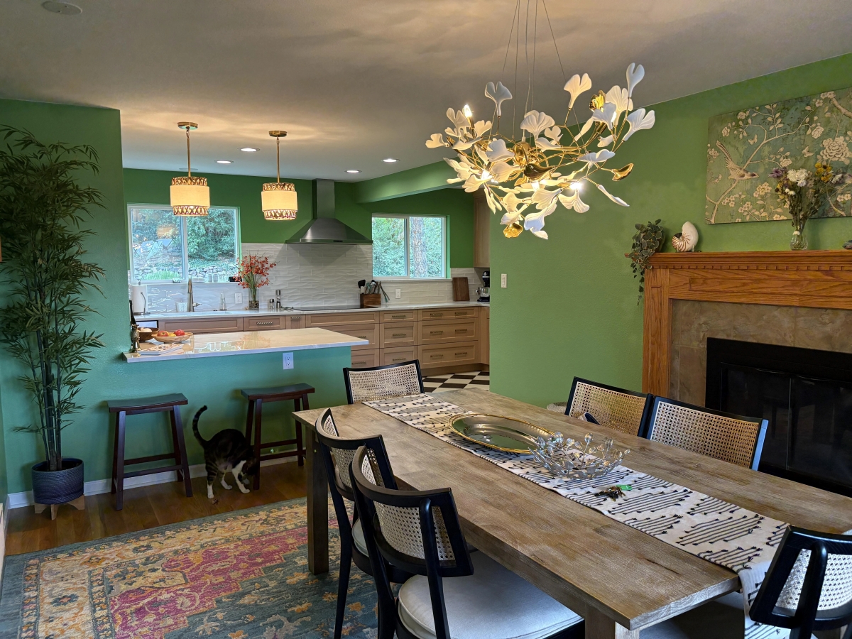 A branching chandelier gives the dining area its own feature