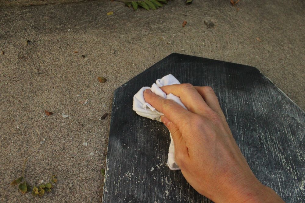 A cloth removes the chalk
