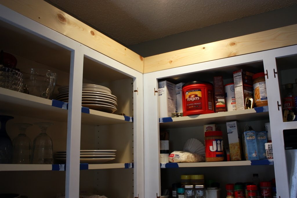 She Painted the 1990s Oak Cabinets Two Colors and Made the Uppers Look Taller