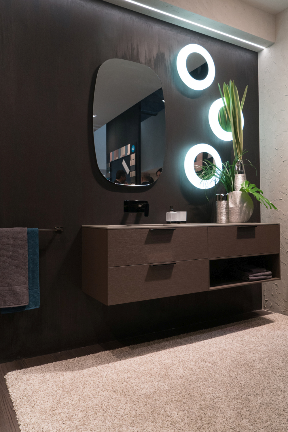 An Open Towel Compartment Interrupts the Wood Fronts