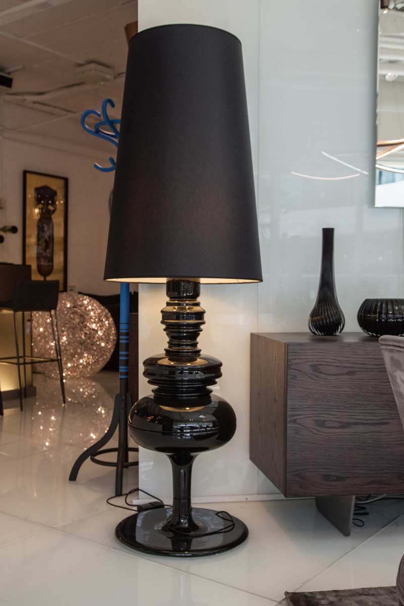 Black Gloss Gives a Floor Lamp the Weight of Furniture