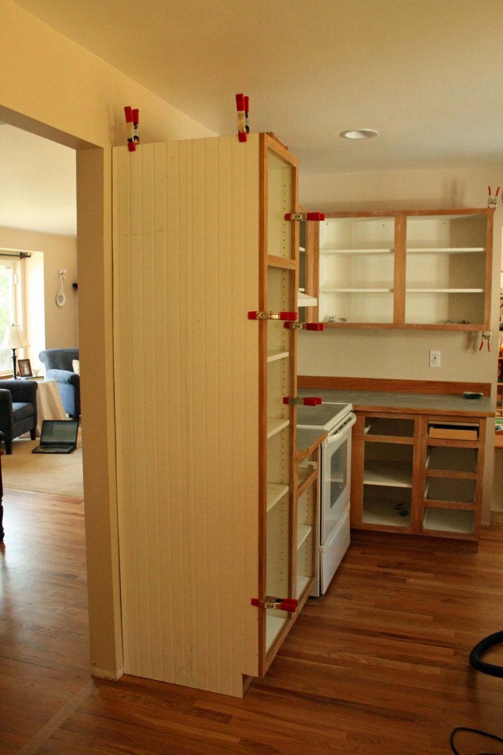 Clamps Held the First Panel Against the Existing Cabinet