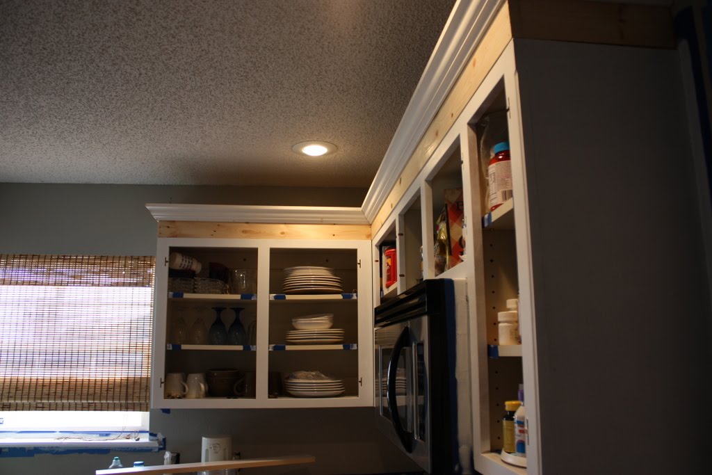 She Painted the 1990s Oak Cabinets Two Colors and Made the Uppers Look Taller