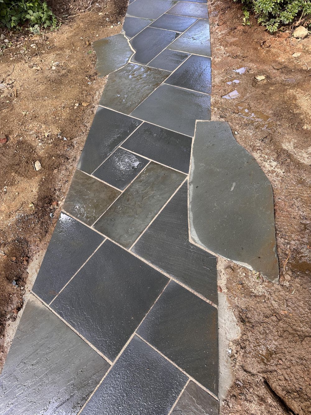 Curved Borders Were Cut After the Stone Was Laid