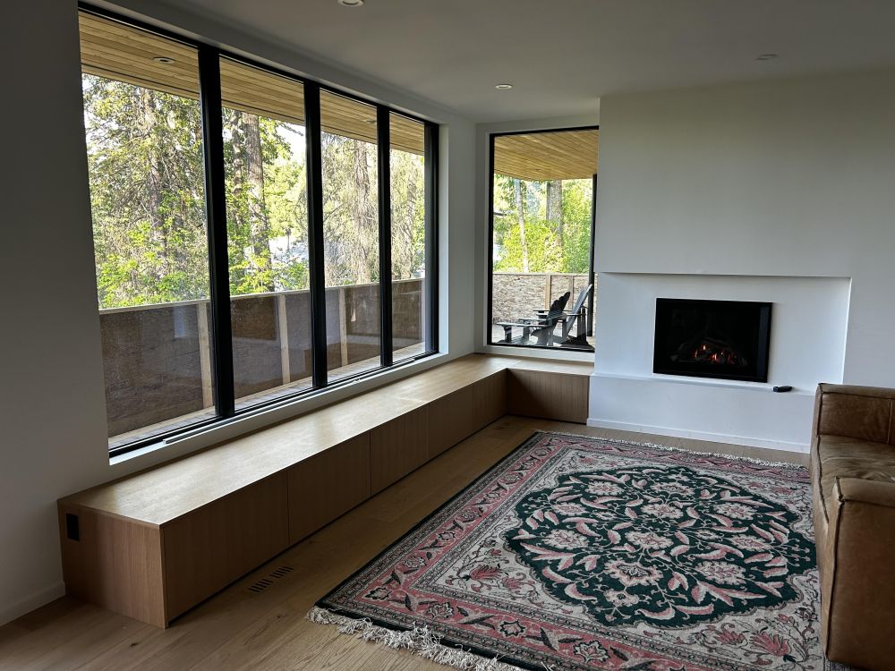 Custom wood panels carry the bench around the corner