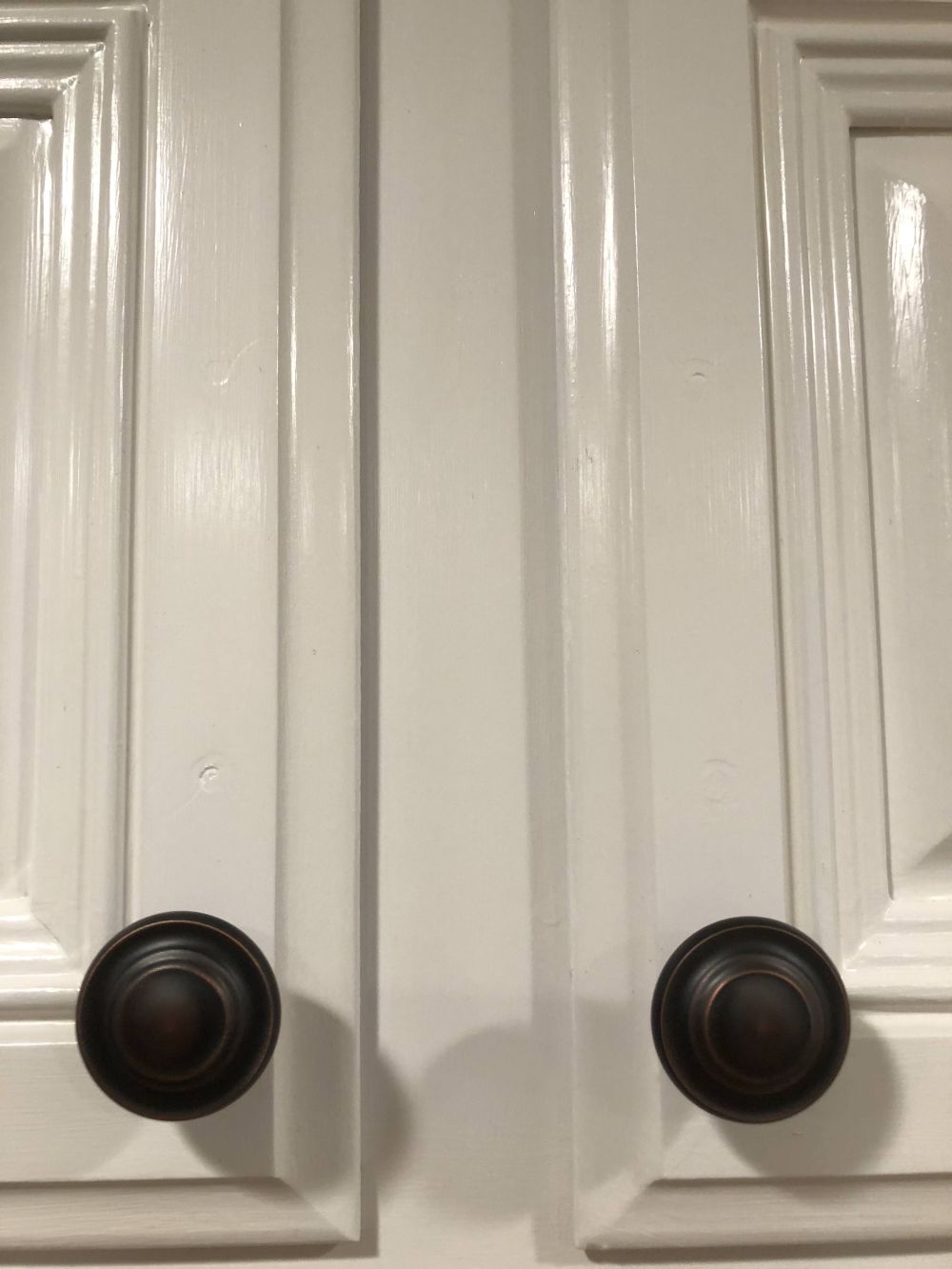 Dark Hardware Added Contrast to the Painted Fronts