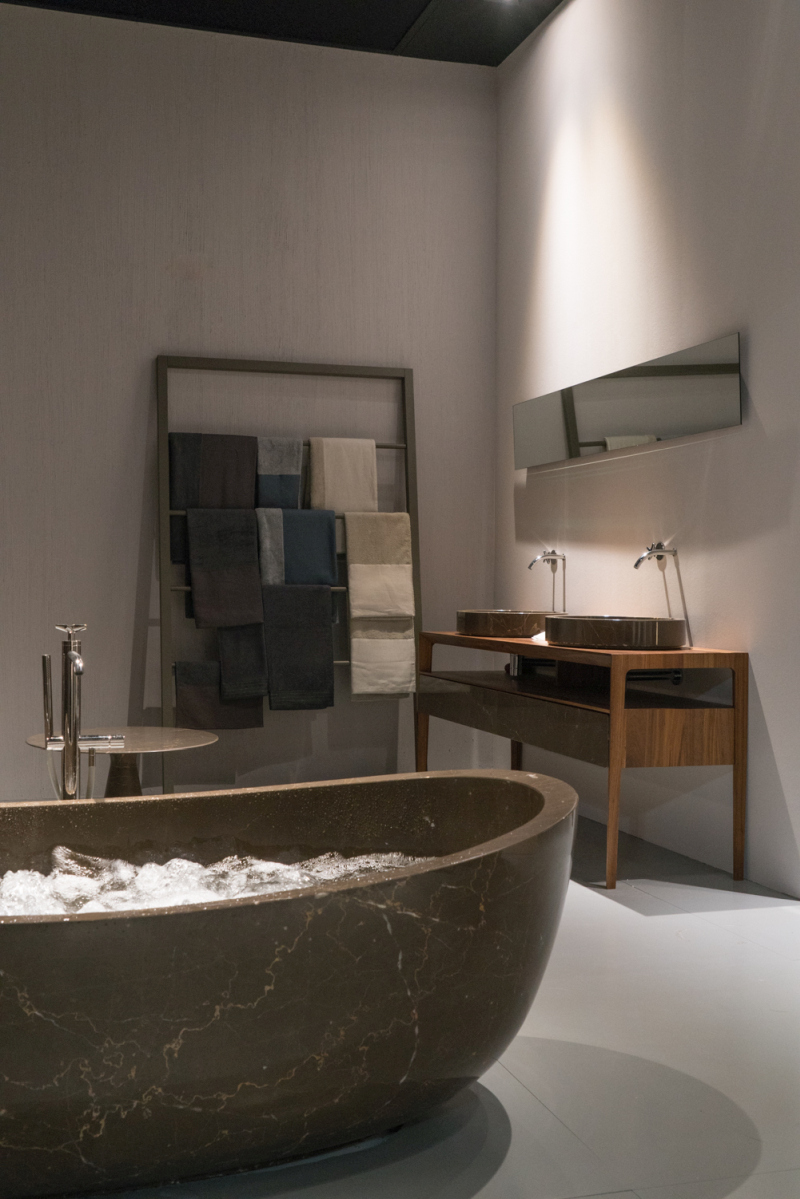 Dark Veining Links the Tub With Two Vessel Basins
