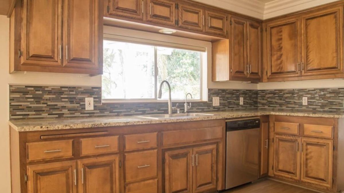 Dark Wood Cabinets Made the Kitchen Feel Gloomy A $220 Makeover Made Them Look Like Different Cabinets