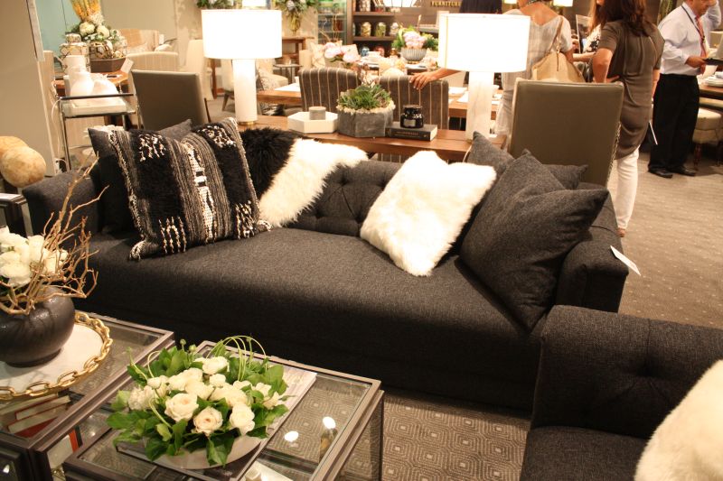 Dark fabric does not have to produce a heavy-looking sofa