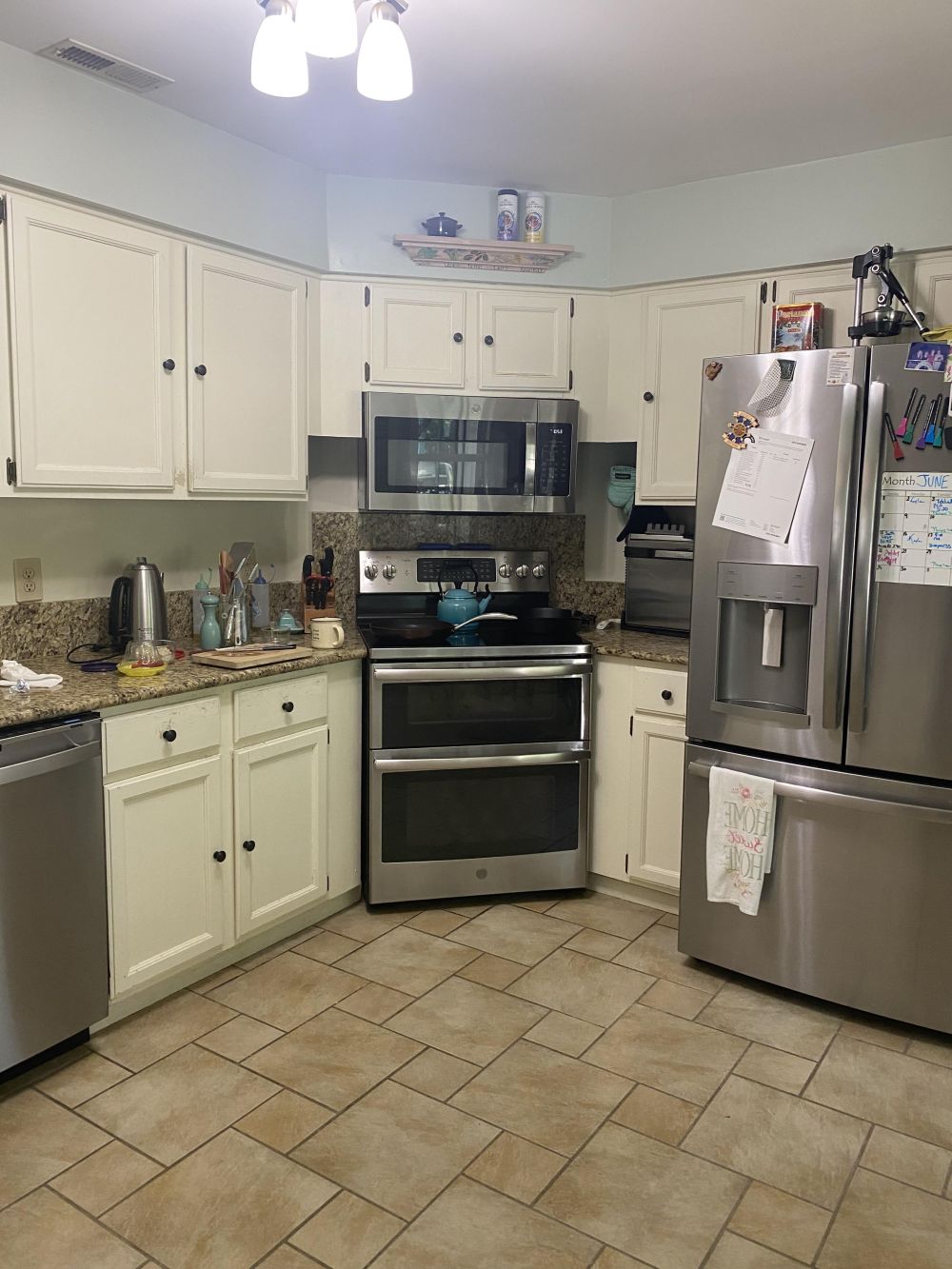 Dated White Cabinets and Granite Counters Came Out