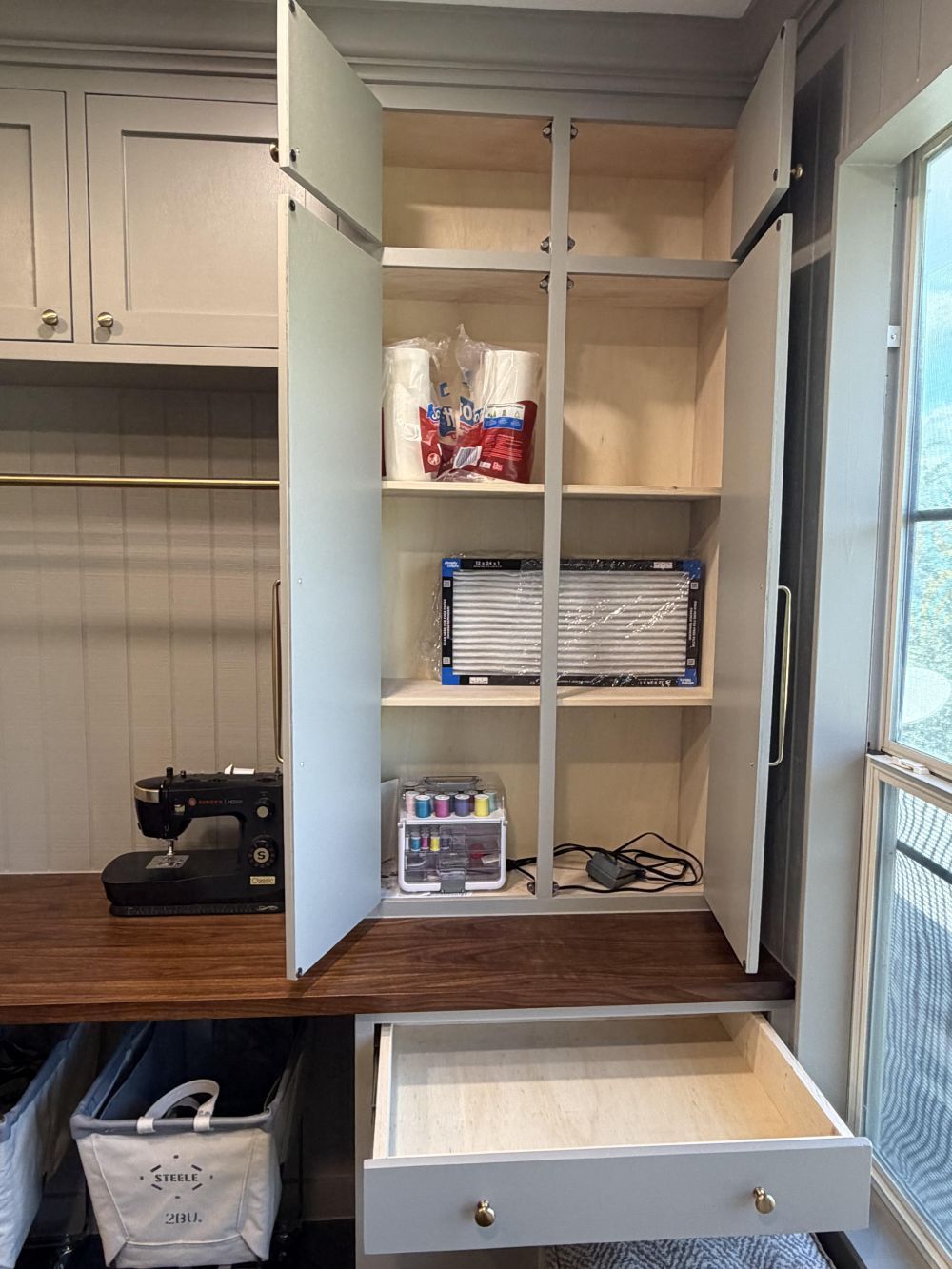 Deep Cabinets Hold Supplies That Would Otherwise Stay Exposed