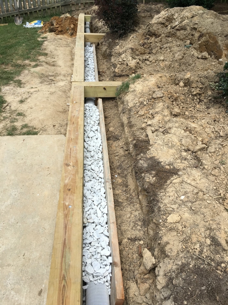 Drainage Pipe Went Behind the Wood