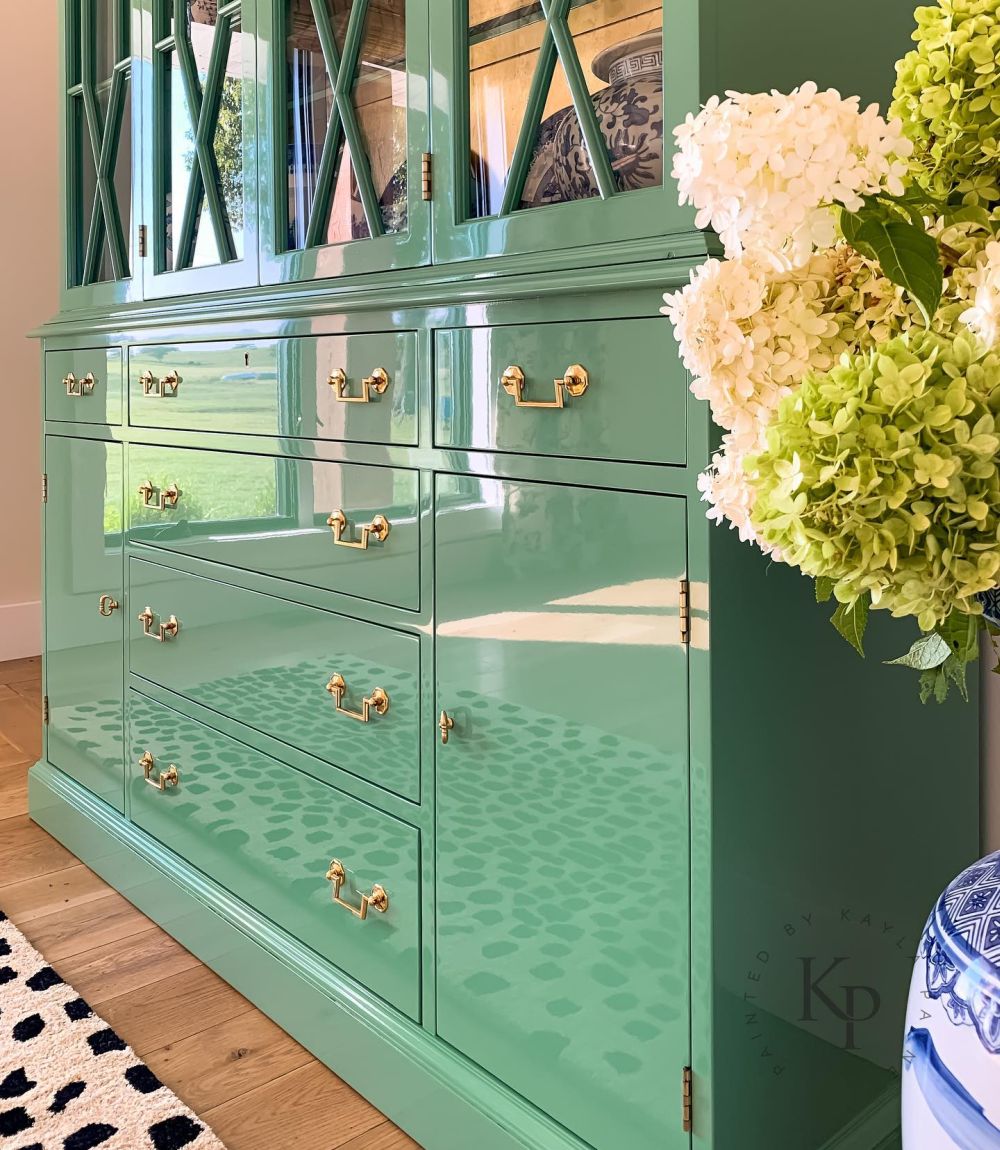 She Painted an Old China Cabinet Green and Made the Wood Shine Like Glass