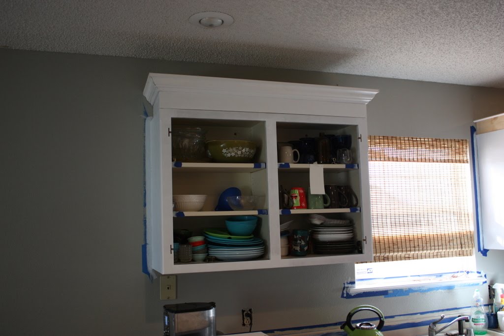 She Painted the 1990s Oak Cabinets Two Colors and Made the Uppers Look Taller