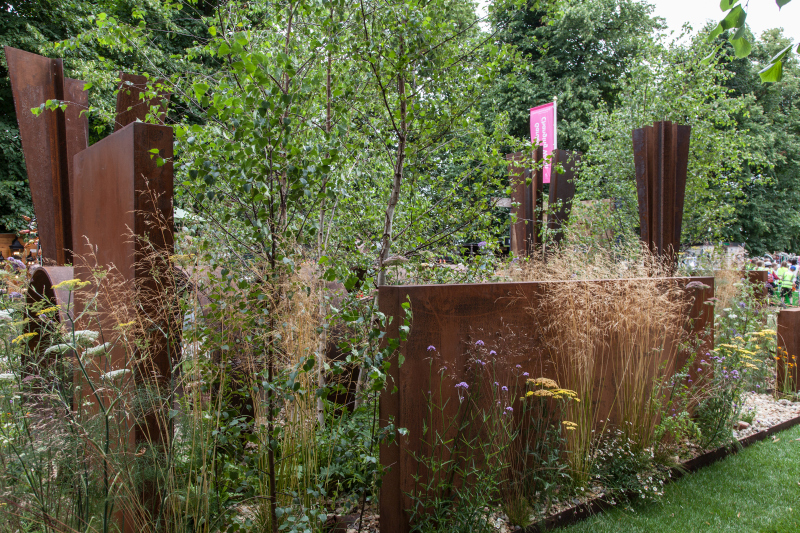 Fine Grasses Become Clear Against Solid Panels