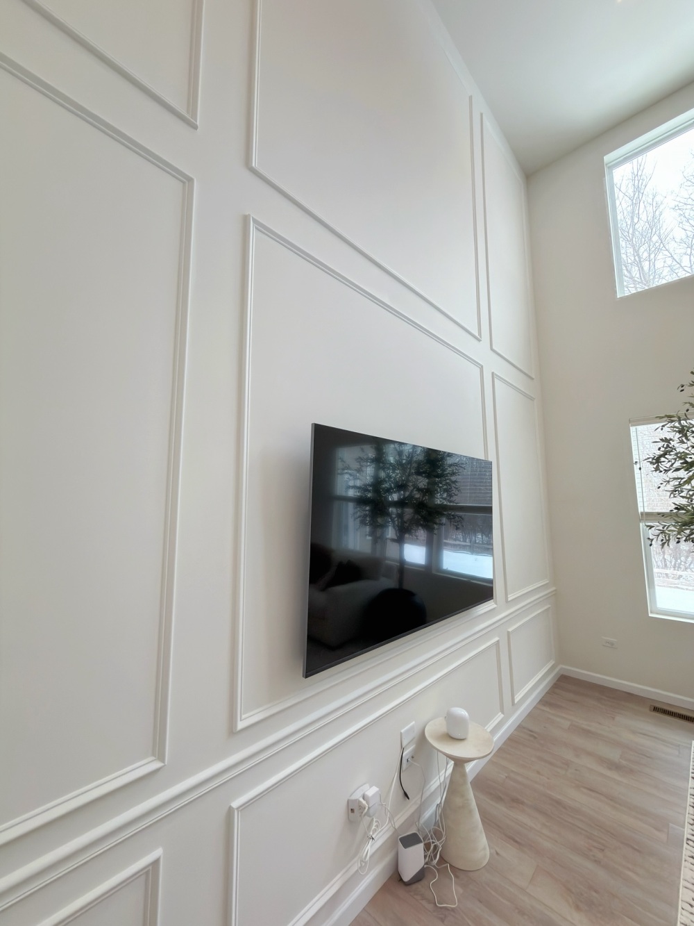 Floor-to-Ceiling Wainscoting Replaced the Bare Surface