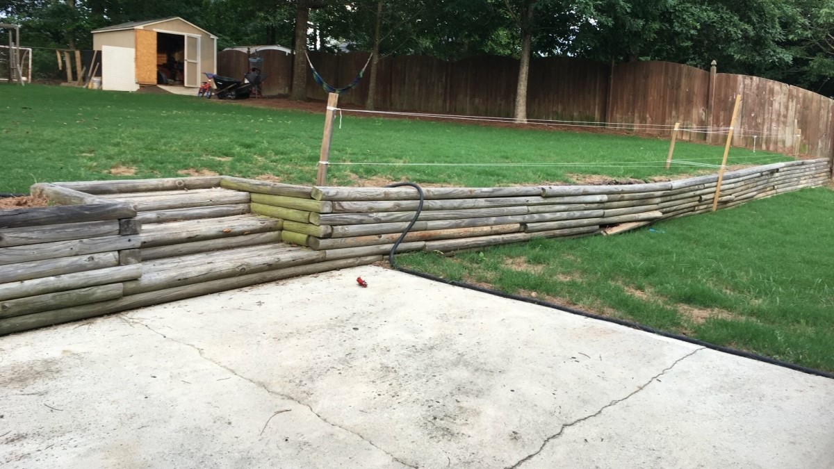 His Backyard Retaining Wall Collapsed After Heavy Rain He Rebuilt It With Massive Timbers