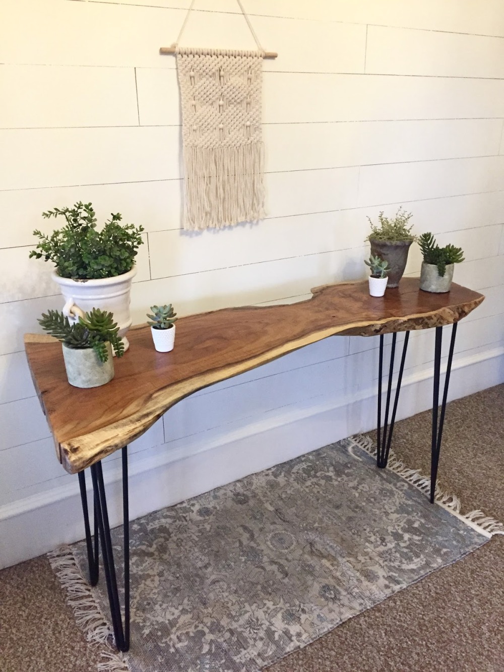 Live-Edge Console Table Against a White Shiplap Wall