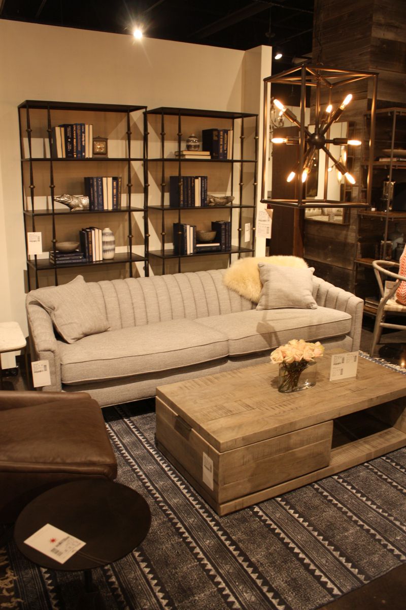 Long sofas can appear lighter when the frame stays low