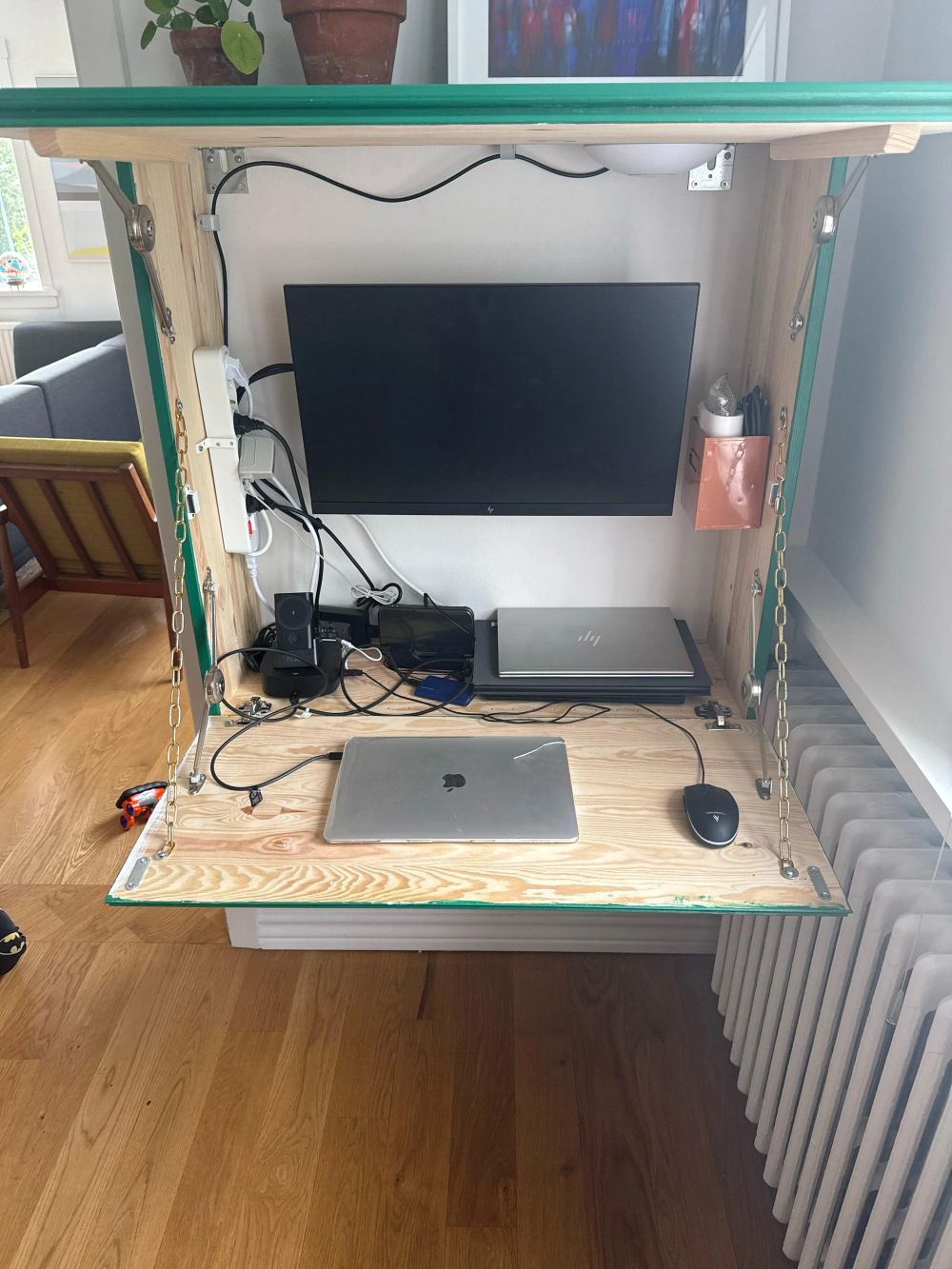 Metal Brackets and Chains Hold the Panels Open