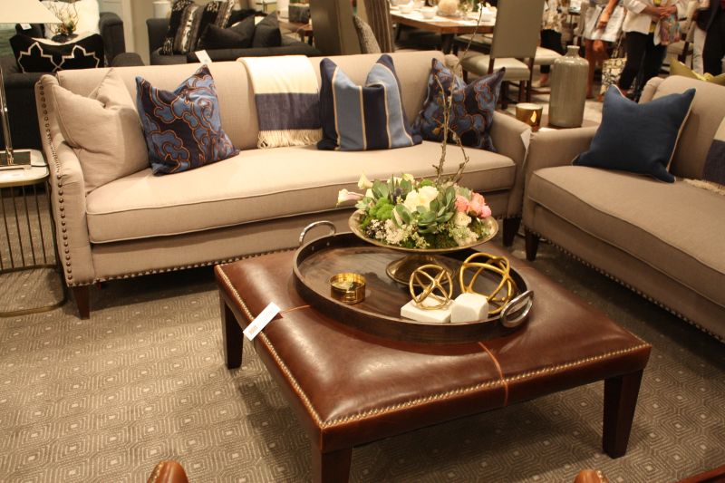 Nailhead trim can define a sofa without covering it in buttons