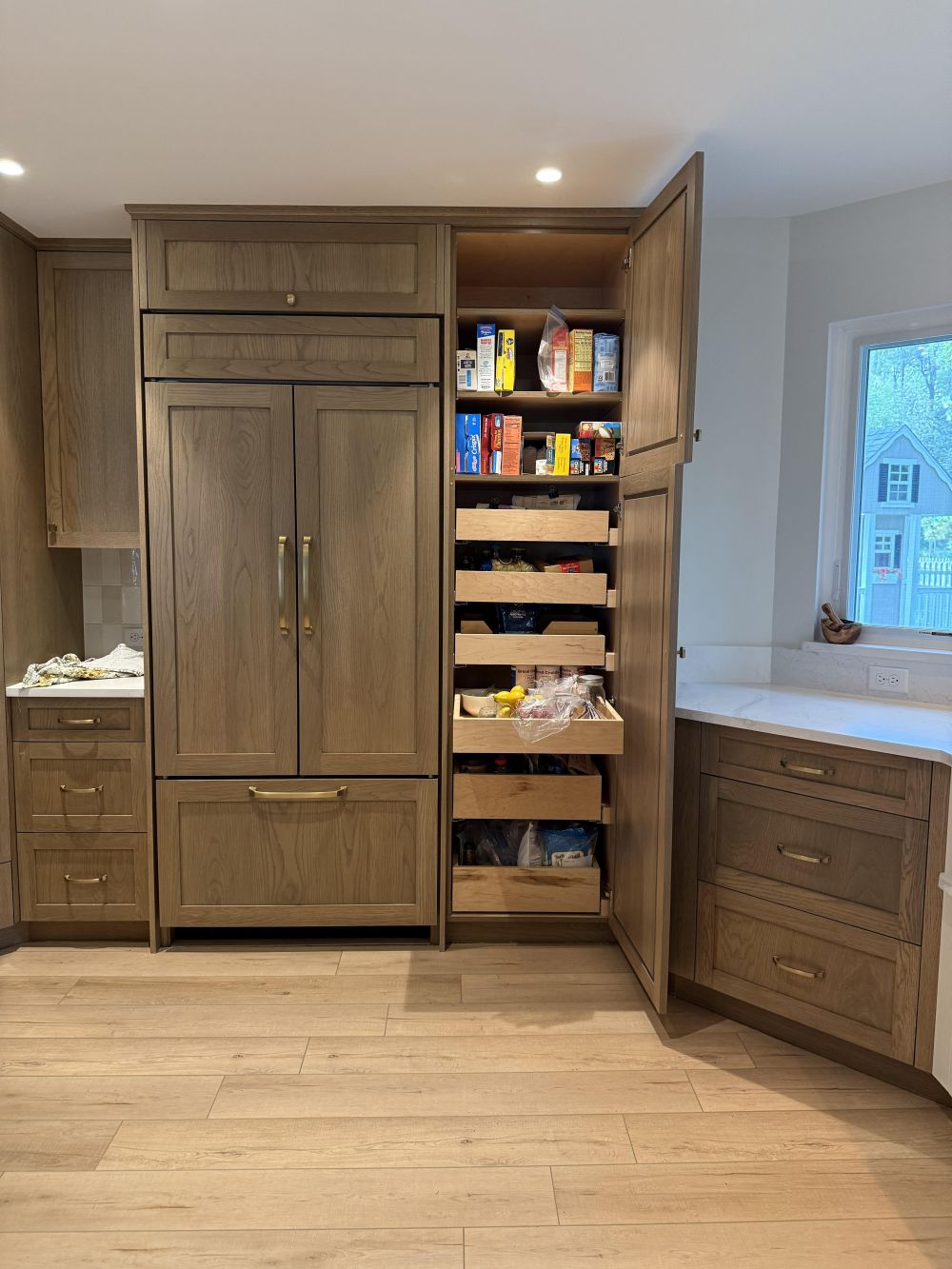 Old Pantry Became a Built-In Refrigerator and Pull-Out Storage