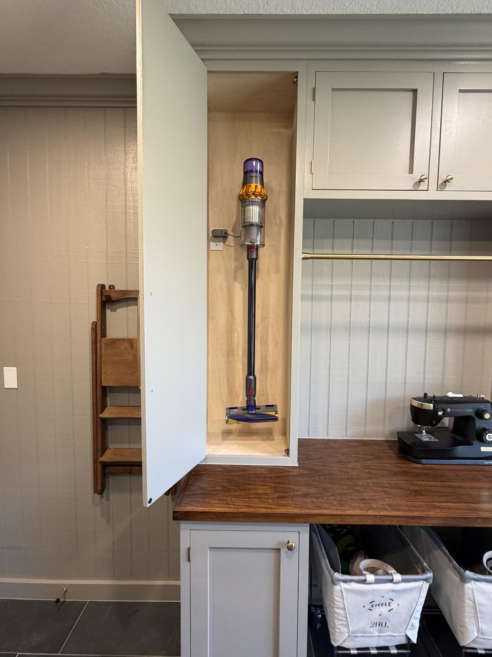 One Tall Cabinet Conceals a Cordless Vacuum