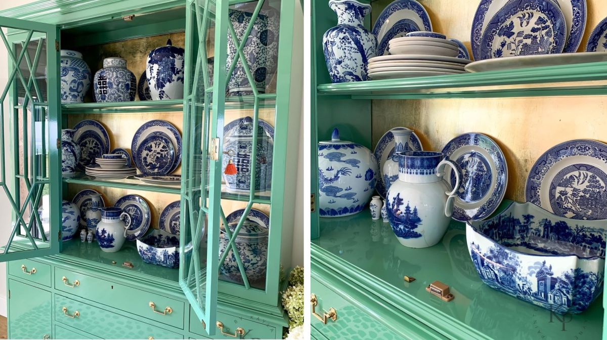 Open doors reveal the china against a gold-toned backdrop