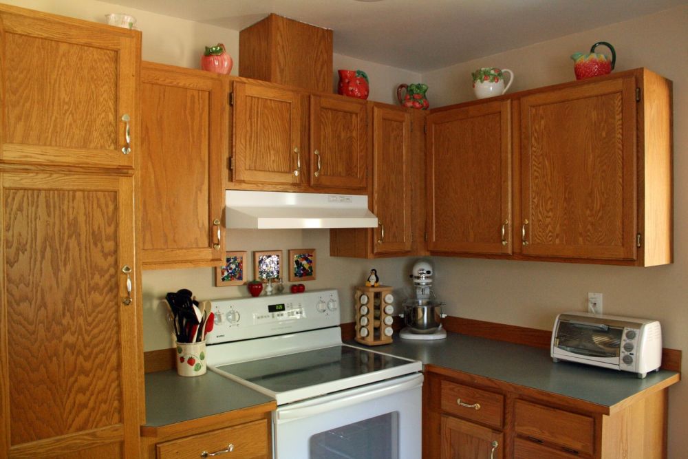Orange Oak Extended Beyond the Cabinet Doors