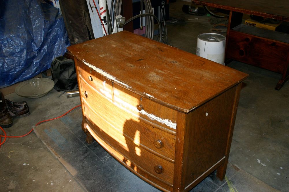 Peeling veneer pushed the project toward paint