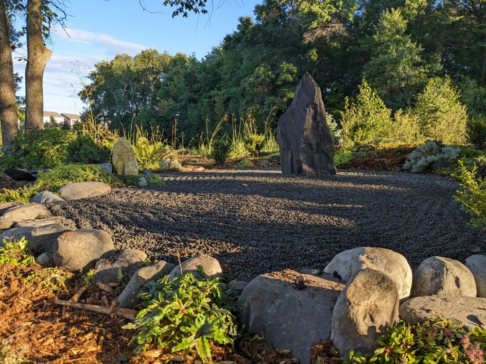 Raked curves gave the upright stone its finished setting