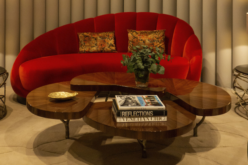 Red Velvet Holds Several Shades Across One Curved Sofa